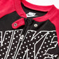 Nike Baby Sportswear Graphic Footed Coverall, Black/Rush Pink, 3M