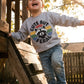 Cute But Feral Raccoon Kids Sweatshirt (Retro Stripe Graphic)
