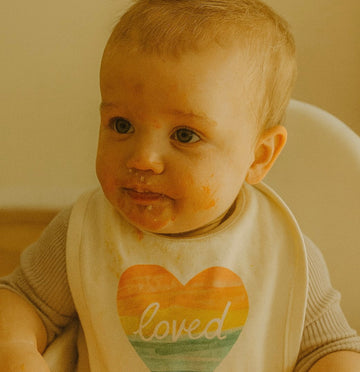 graphic bib | loved rainbow heart